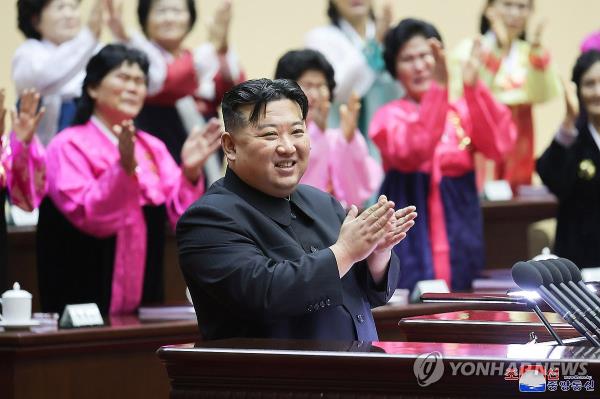 This photo, carried by North Korea's official Korean Central News Agency on Dec. 4, 2023, shows the North's leader Kim Jong-un attending the Fifth Natio<em></em>nal Meeting of Mothers held the previous day in Pyongyang. (For Use o<em></em>nly in the Republic of Korea. No Redistribution) (Yonhap)