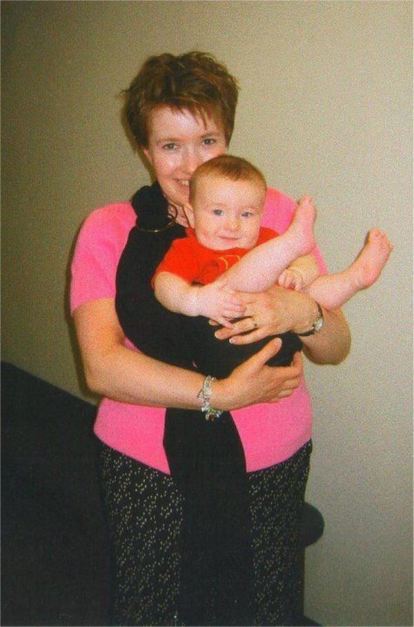 The author and her son with a (slipped) ring sling. 