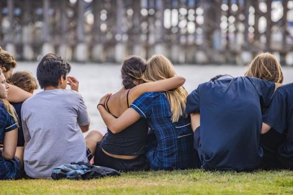 Emotio<em></em>nal scenes on the Swan River in North Fremantle after school on Mo<em></em>nday following the death of classmate Stella Berry on Saturday after a fatal shark attack.