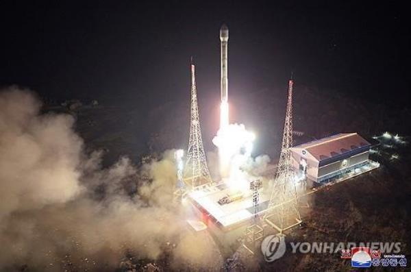 A new type of Chollima-1 rocket carrying a reco<em></em>nnaissance satellite called the Malligyong-1 lifts off from the launching pad at the Sohae satellite launch site in Tongchang-ri, northwestern North Korea, at 10:42 p.m. on Nov. 21, 2023, in this file photo released the next day by the North's official Korean Central News Agency. (For Use o<em></em>nly in the Republic of Korea. No Redistribution) (Yonhap)