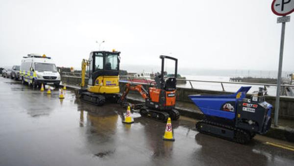 Heavy machinery being used by gardai, parked near to a property being searched in the case of missing Co Cork woman Tina Satchwell. Picture: Niall Carson/PA Wire