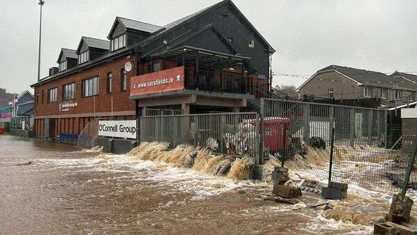 While the worst of the flooding was in East Cork, other areas were affected too. Here, a pedestrian makes his way through floodwaters on Rutland St off South Terrace in Cork City during Storm Babet on Wednesday morning. Picture: Larry Cummins